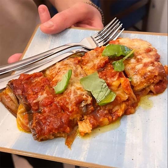 a plate with a lasagna on it